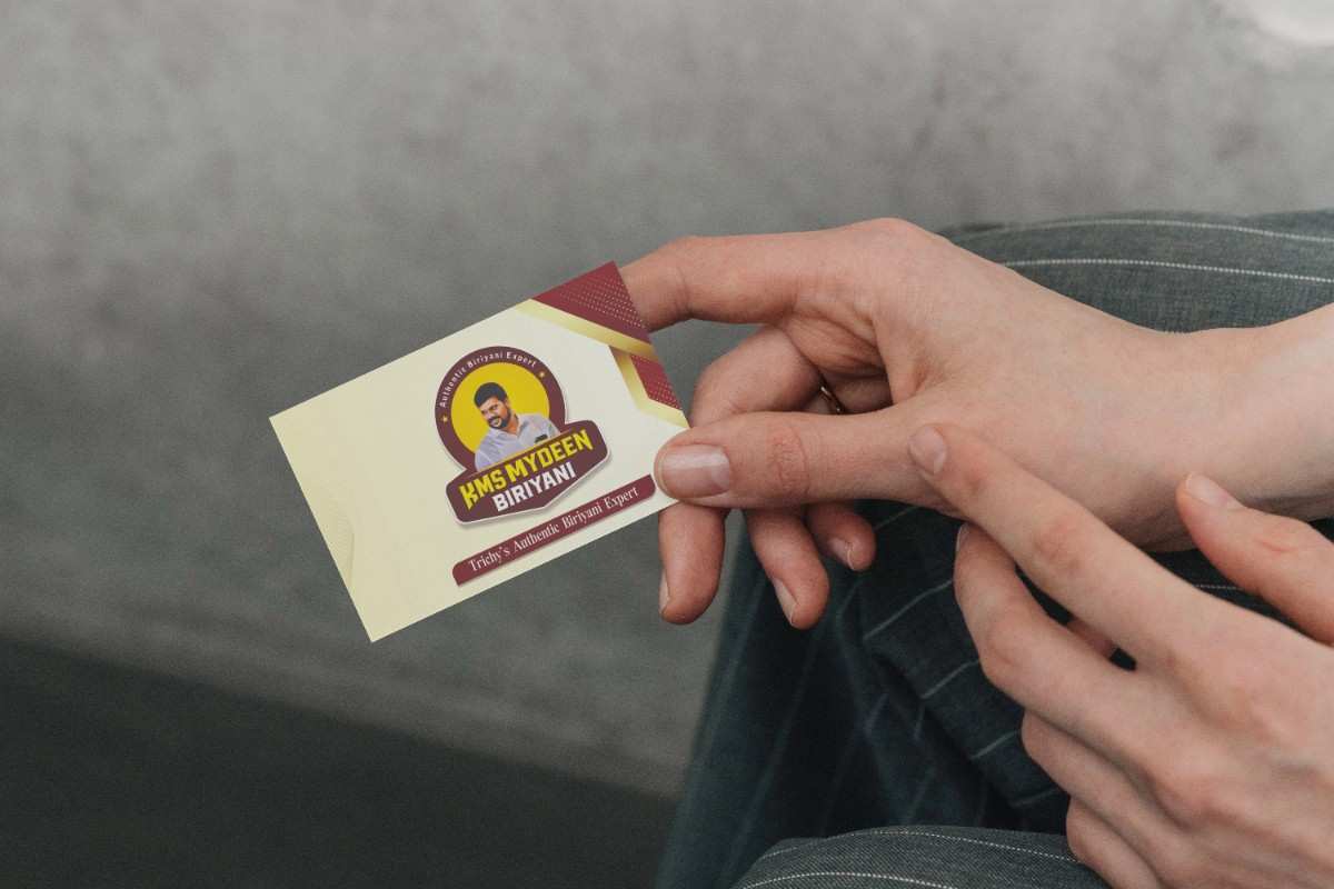 Business Card in Hands Mockup